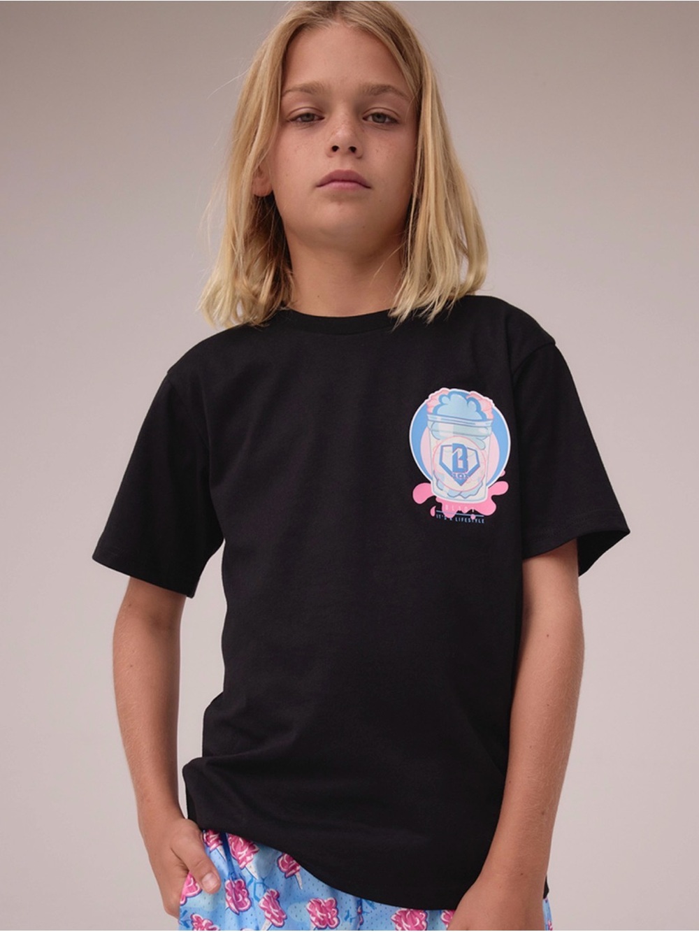 Great condition, lightly worn!  Black Graphic Tee with Blue & Pink Emble
